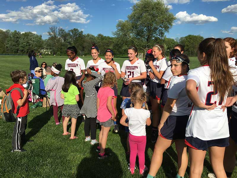 Photo Gallery – Kindergarten “Adopts” Girls’ Varsity Lacrosse Team